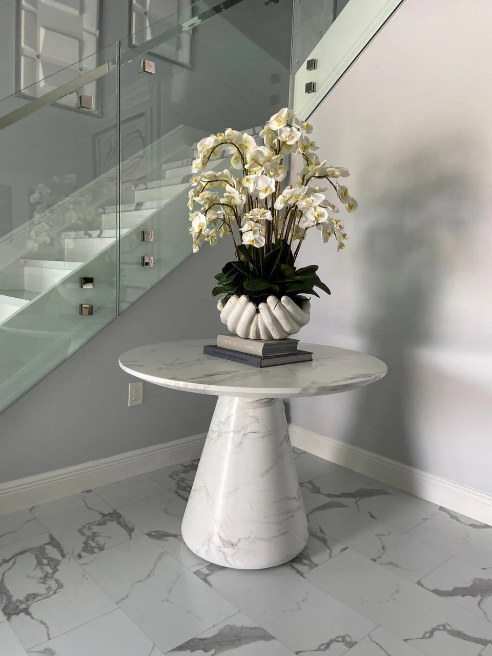 White Phalaenopsis Orchids in White Open Hands Sculpture Vase