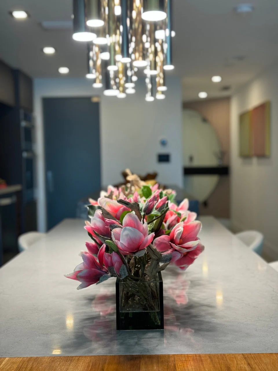 Casa Moderna Glass Planter with Bright Pink Magnolias and Driftwood